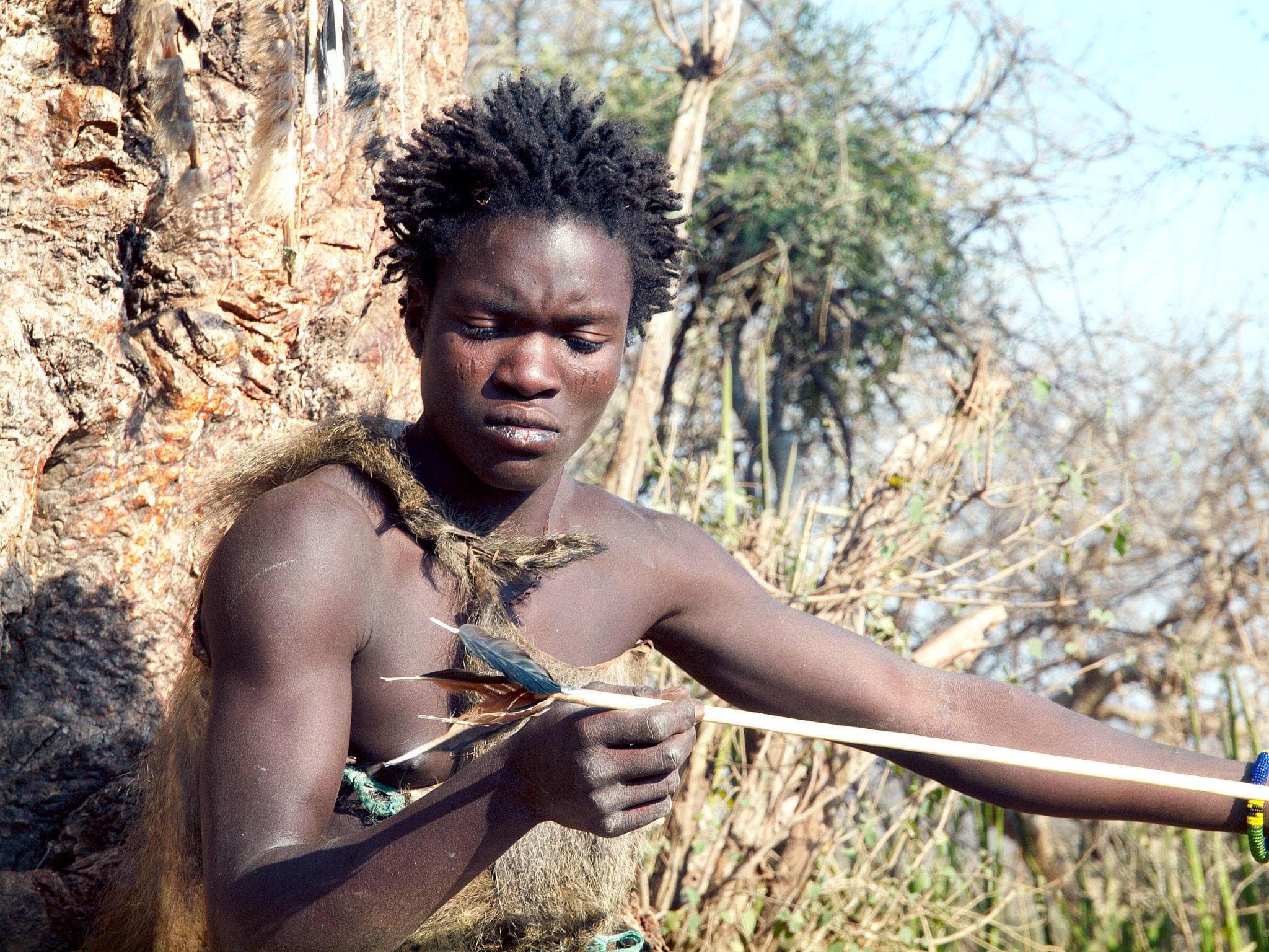 Hadzabe hunter tracking at dawn