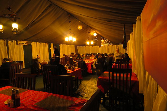 Luxury tented camp interior overlooking the plains
